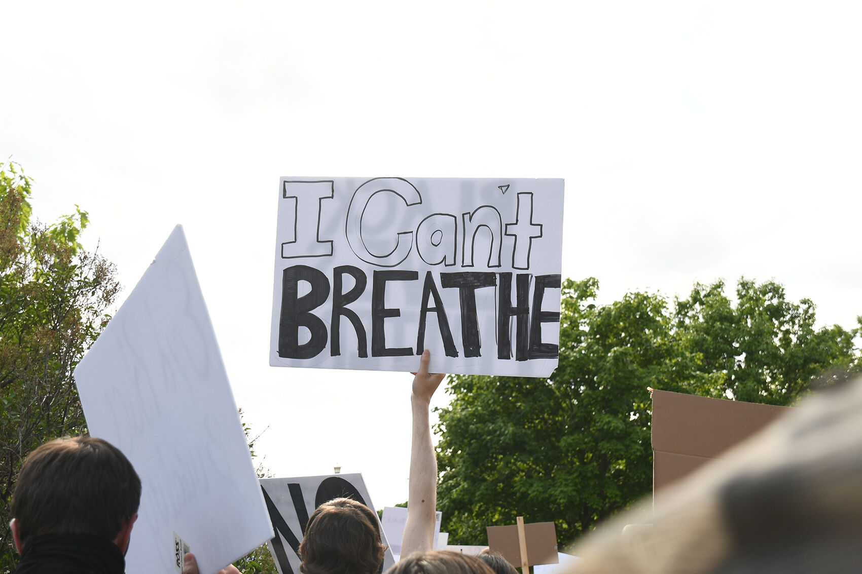 "I can't breathe" sign at Spencer march